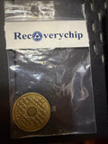 Serenity Prayer back of the RecoveryChip 1 Year medallion in branded packaging